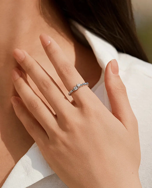 Adjustable beaded moissanite ring in 925 sterling silver with two round D color stones
