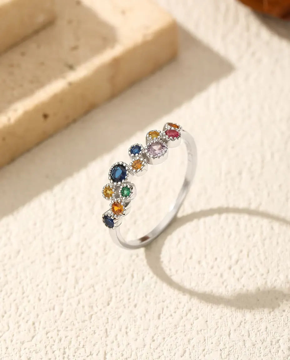 Colorful zirconia cluster ring with milgrain halos in 925 silver