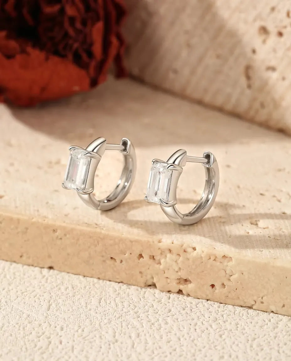 Emerald cut moissanite huggie earrings in 925 sterling silver