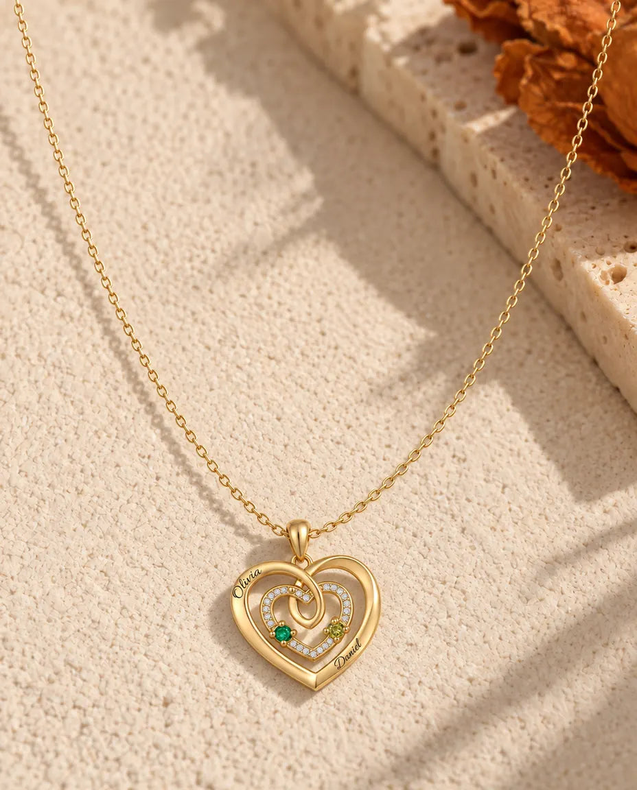 Gold triple heart necklace with two birthstones and two engraved names