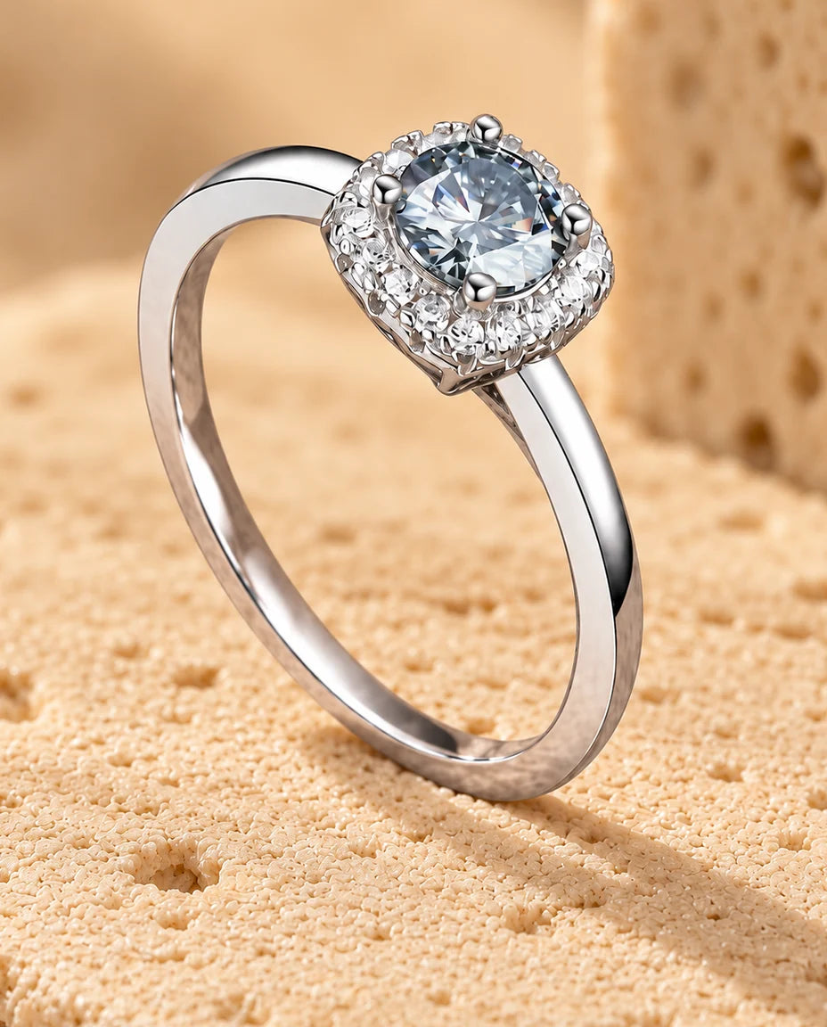 0.5ct Square Halo Moissanite Ring - displayed on a travertine block