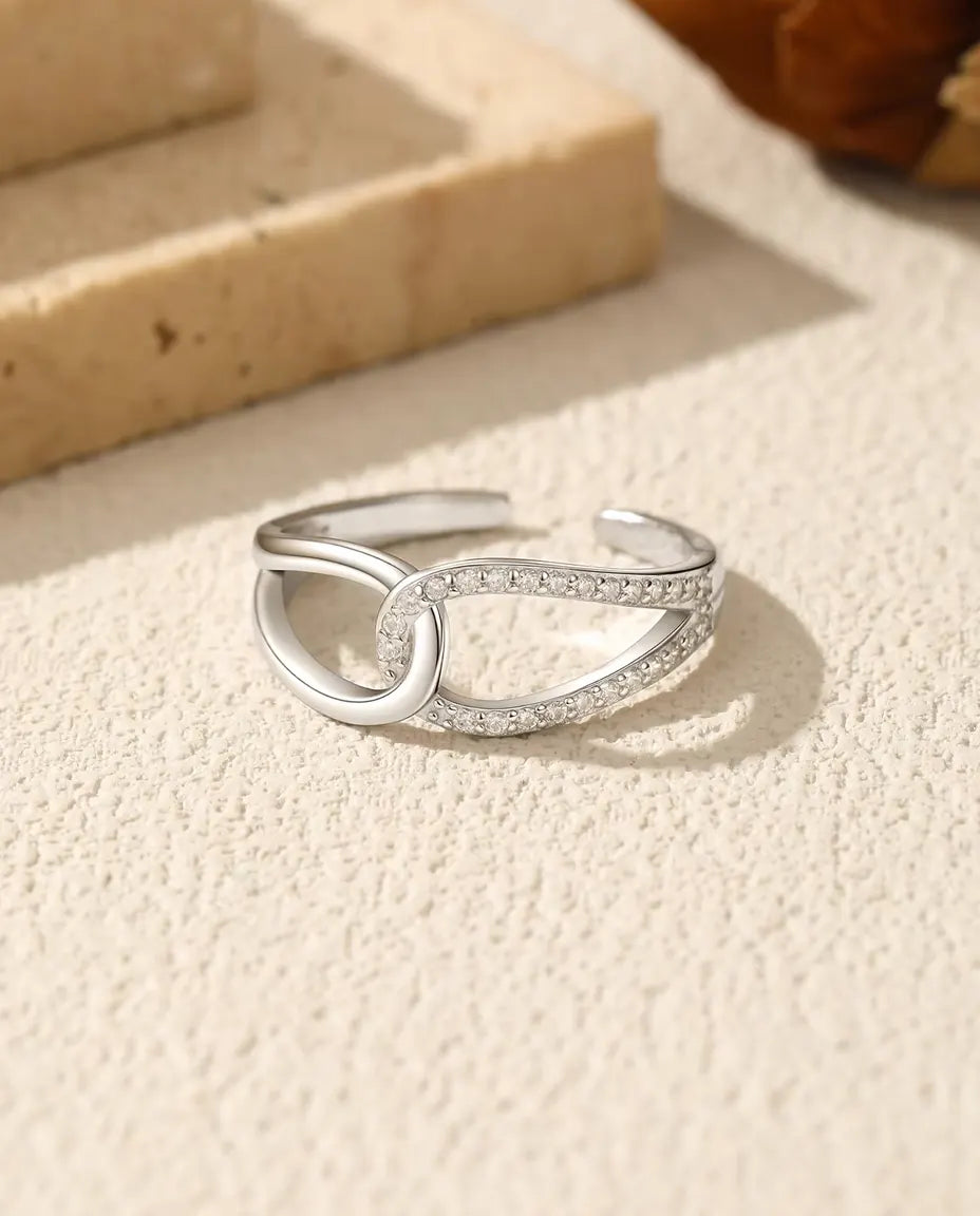Interlocking loop open ring with pave zirconia in 925 silver