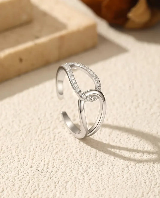 Interlocking loop open ring with pave zirconia in 925 silver
