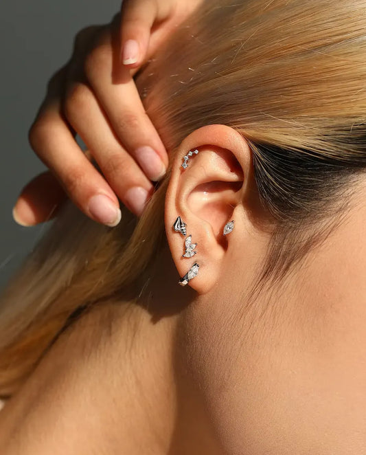 Marquise Moissanite Leaf Stud Earrings in 925 Sterling Silver - worn in the ear, close-up