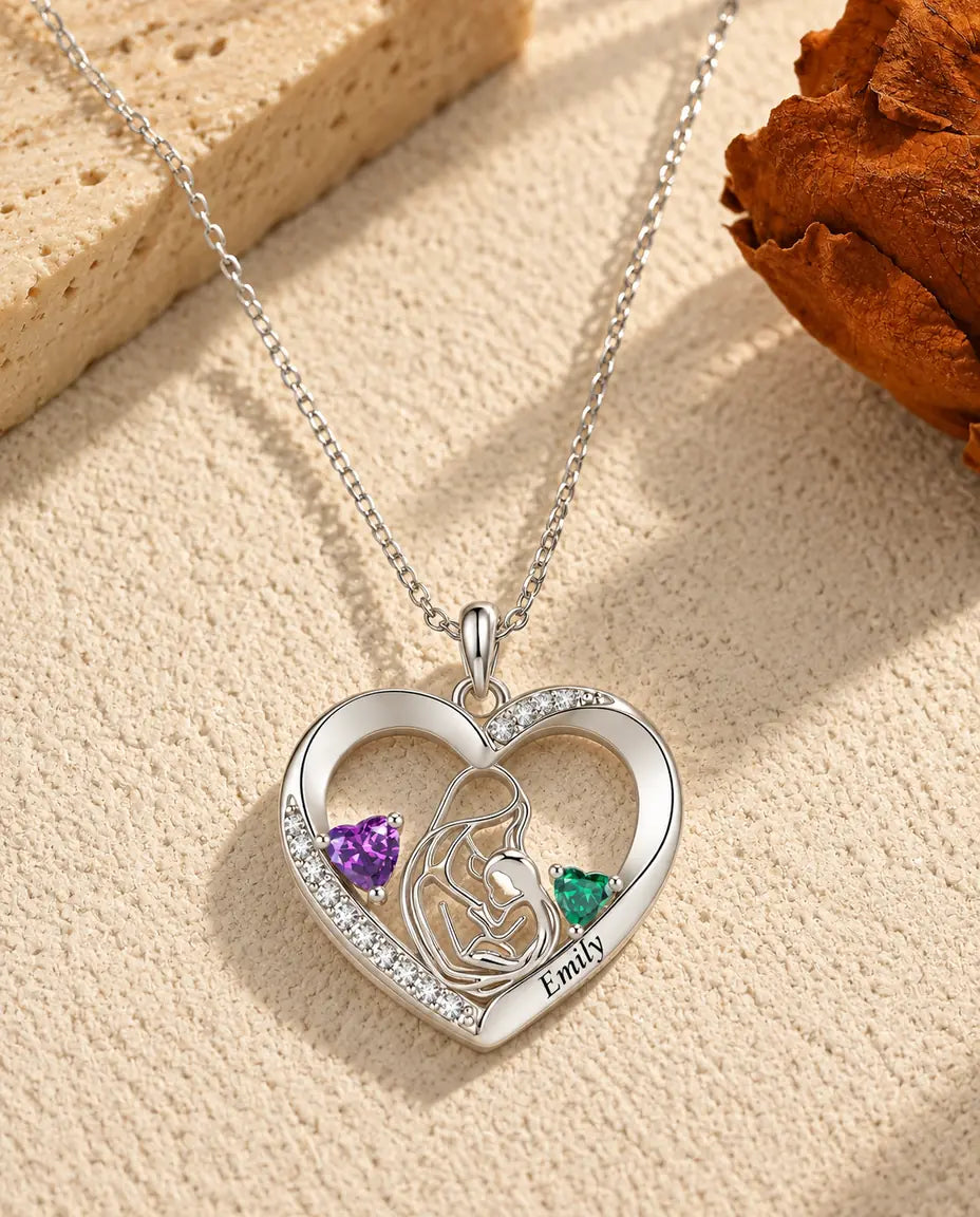 Silver mother and child heart necklace with two birthstones and an engraved name