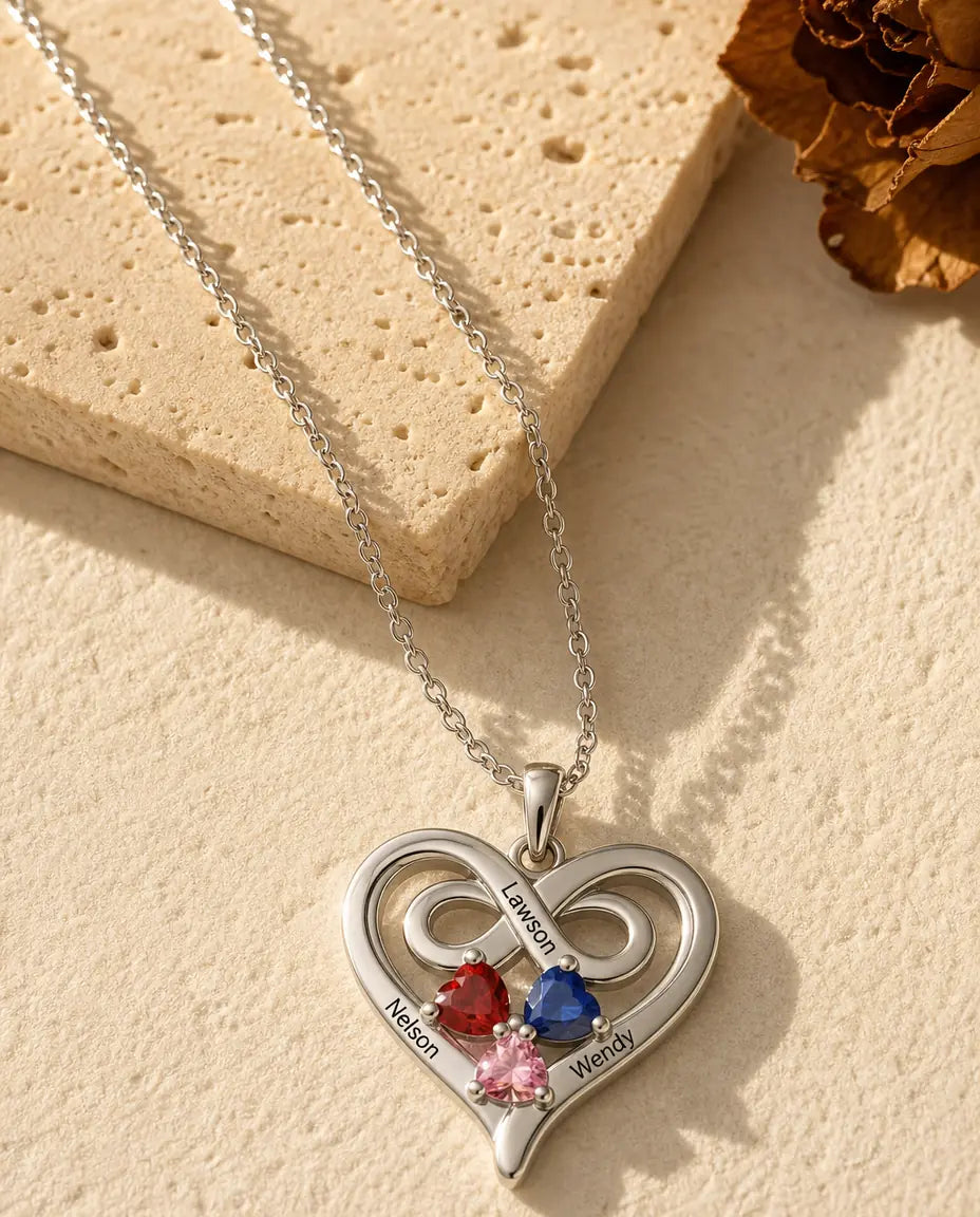 Personalized heart birthstone necklace with 3 engraved names and 3 heart-cut birthstones