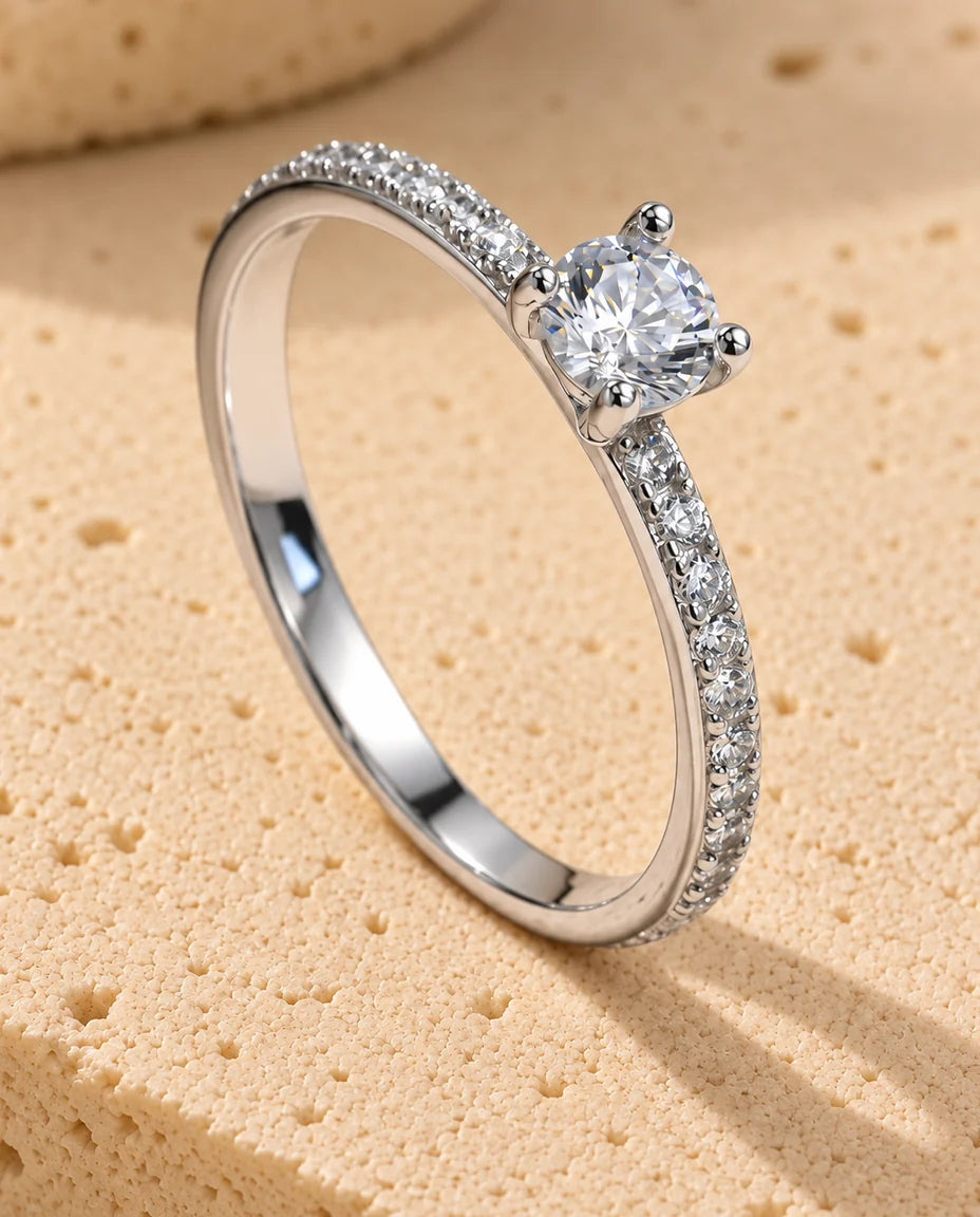 Square Cut Moissanite Engagement Ring - displayed on a travertine block