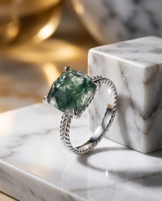 Oval-cut moss agate ring in sterling silver