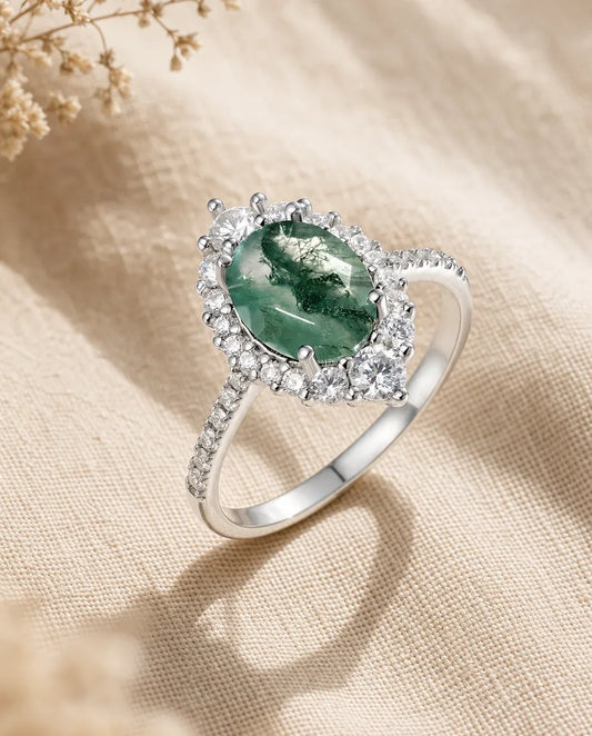 Pear-shaped moss agate engagement ring in sterling silver