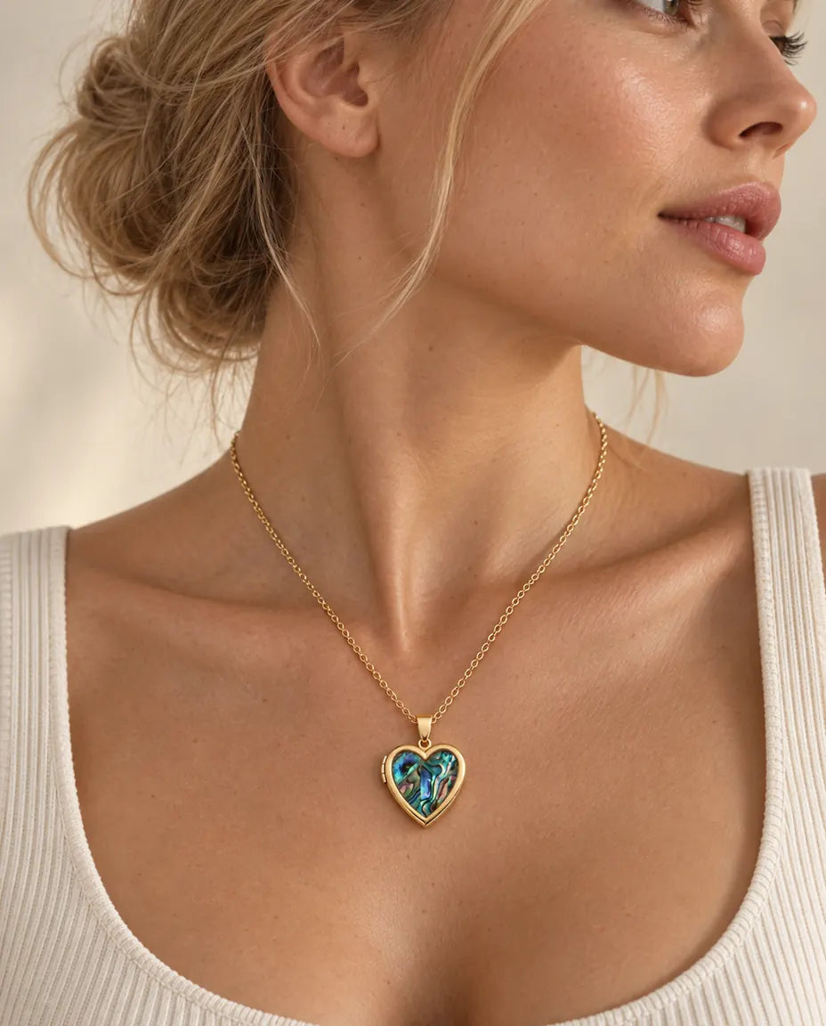 Personalized Abalone Shell Heart Locket Necklace That Holds 2 Photos worn on a model