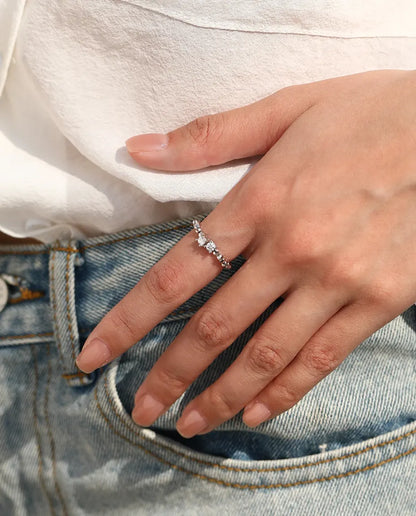 Adjustable beaded moissanite ring in 925 sterling silver with two round D color stones