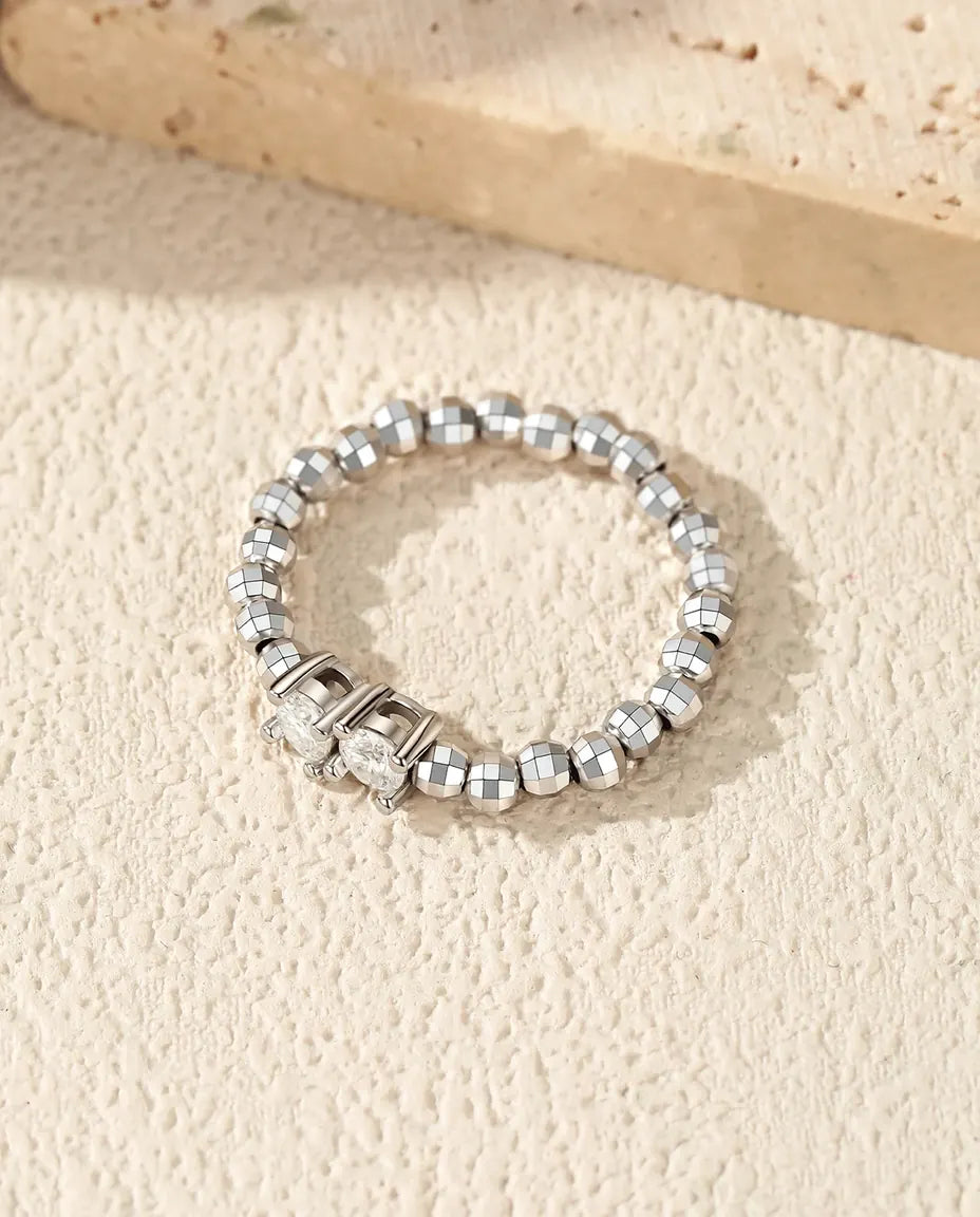 Adjustable beaded moissanite ring in 925 sterling silver with two round D color stones