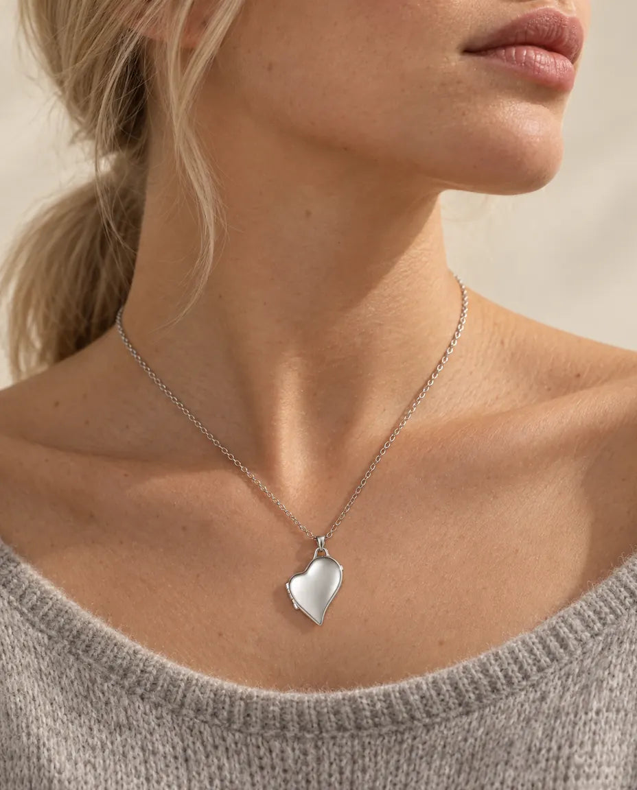 Personalized Asymmetric Heart Photo Locket Necklace That Holds 2 Pictures worn on a model