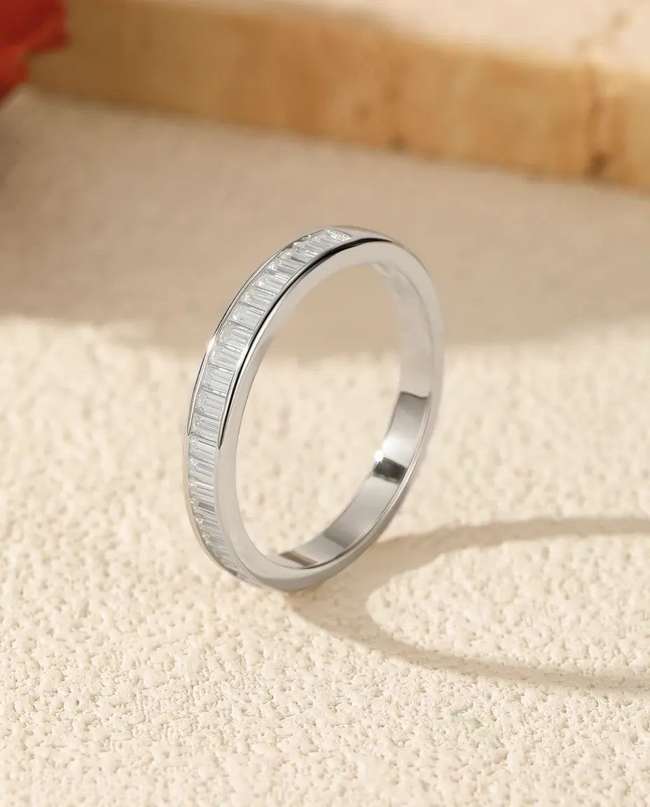Channel-set baguette moissanite eternity band in 925 sterling silver