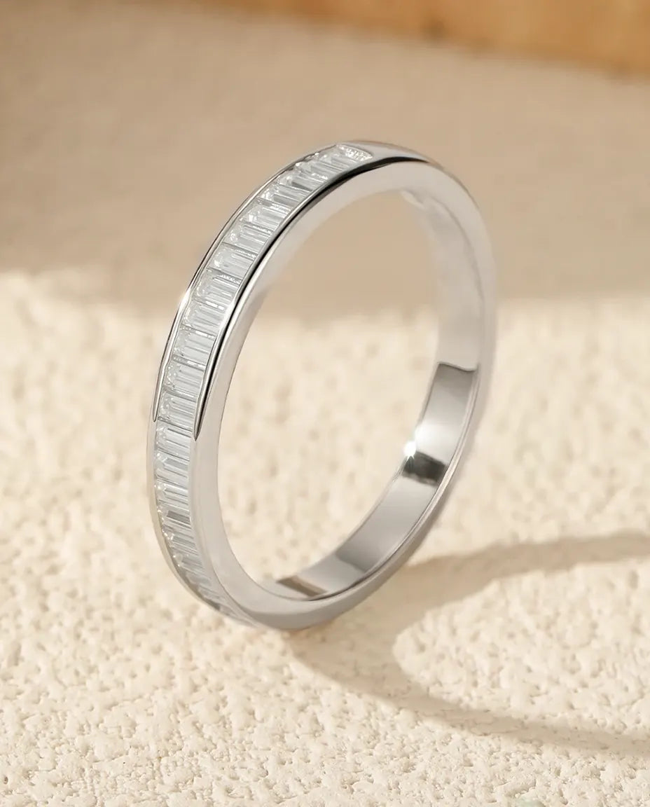 Channel-set baguette moissanite eternity band in 925 sterling silver