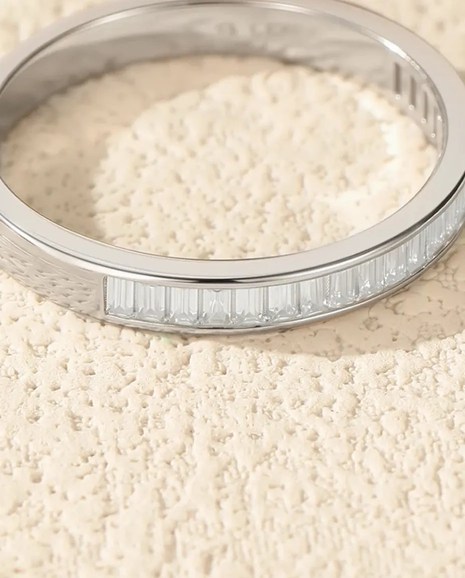 Channel-set baguette moissanite eternity band in 925 sterling silver