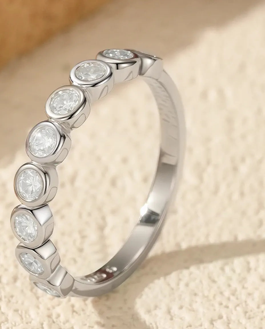 Bezel-set moissanite eternity ring in 925 sterling silver, bubble band