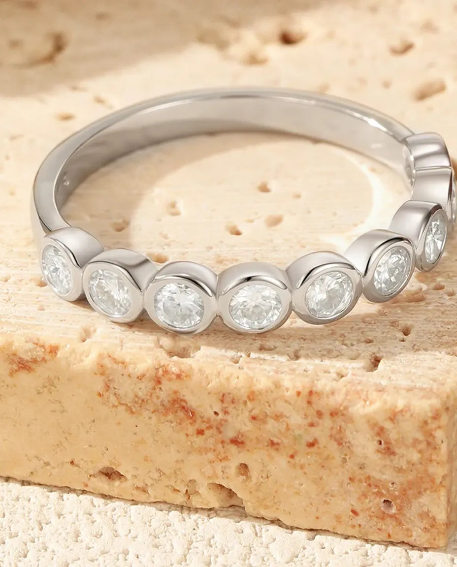 Bezel-set moissanite eternity ring in 925 sterling silver, bubble band