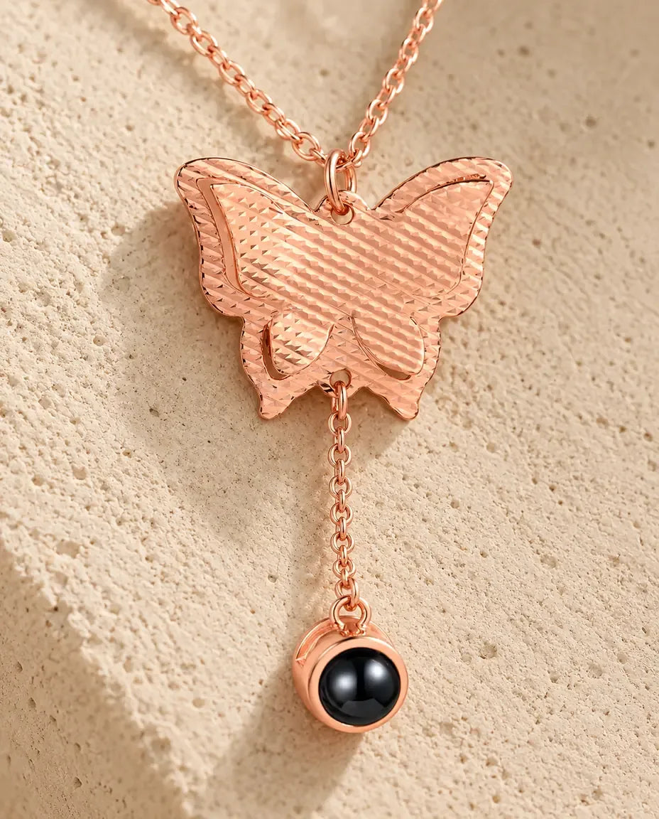 Personalized Butterfly Photo Projection Necklace - close-up of the projection charm
