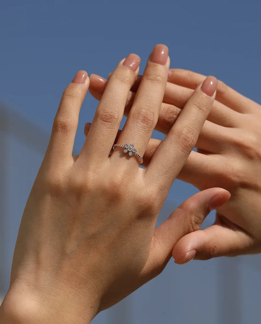 dainty flower moissanite ring in 925 sterling silver with beaded band