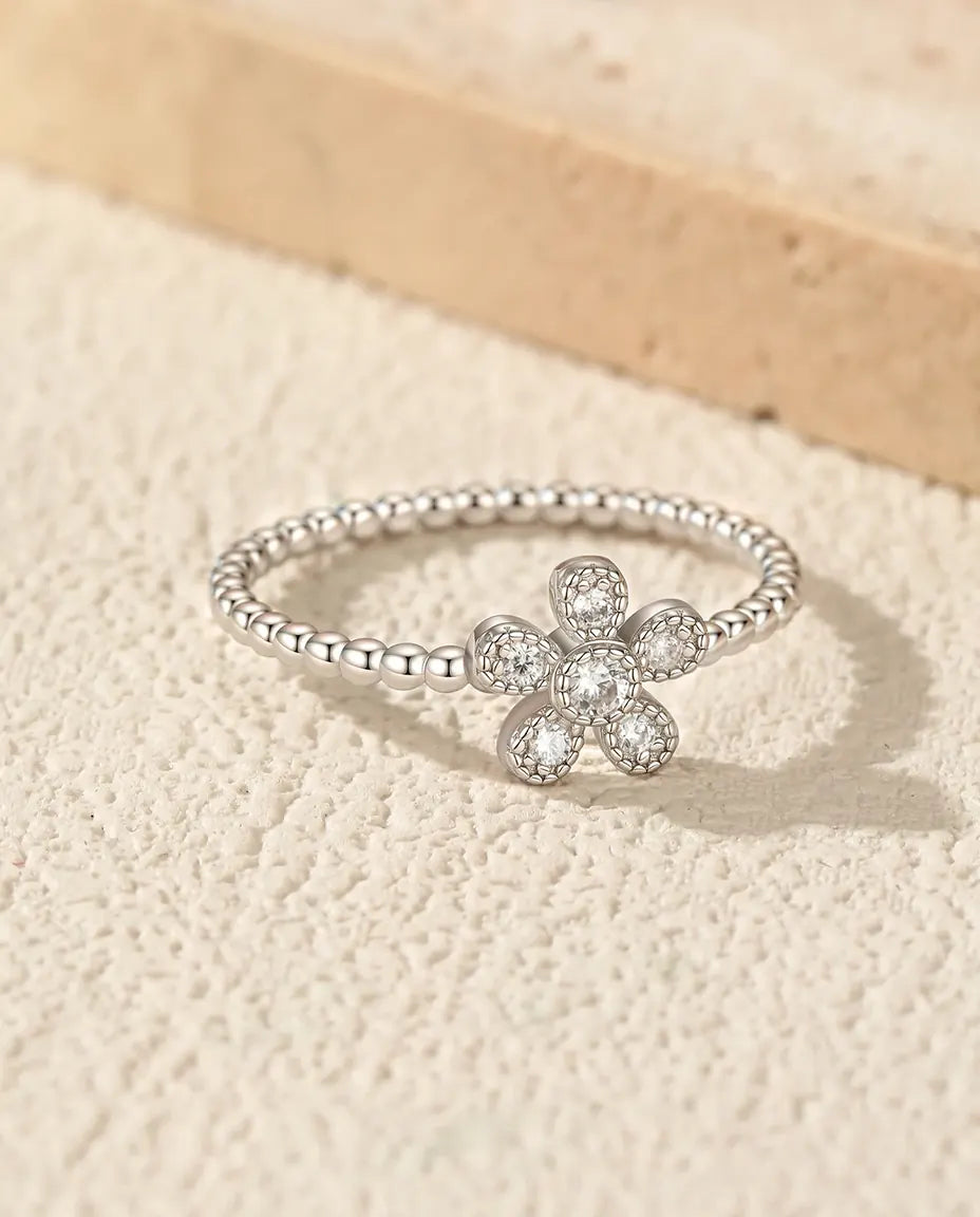 dainty flower moissanite ring in 925 sterling silver with beaded band