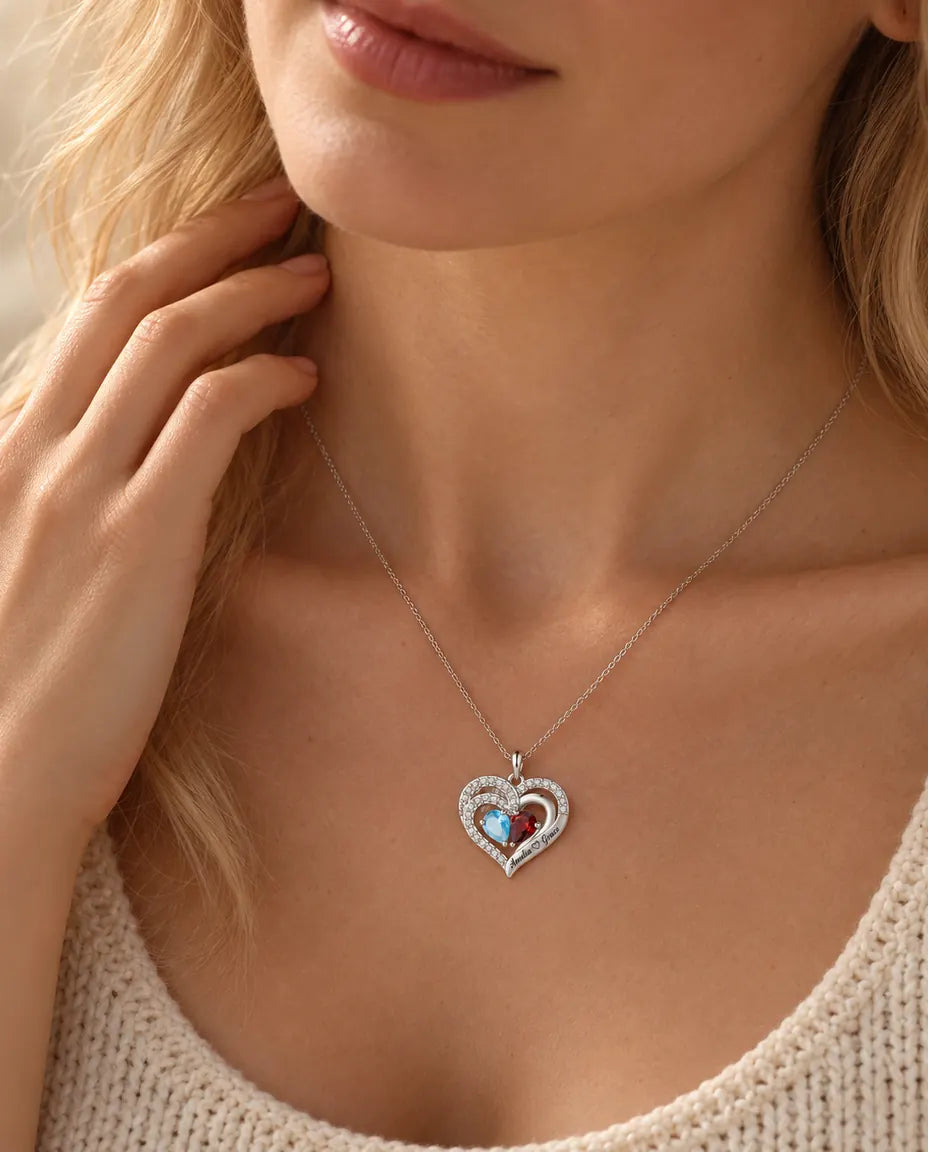 Blonde woman wearing the personalized double heart birthstone necklace