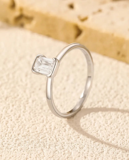 Emerald cut moissanite engagement ring in 925 sterling silver