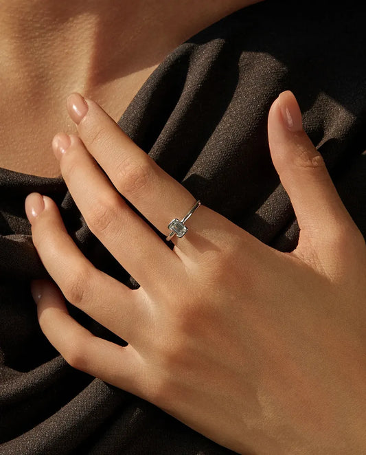 Emerald cut moissanite engagement ring in 925 sterling silver