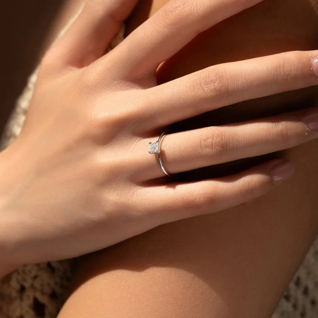 Emerald Cut Moissanite Solitaire Ring in Sterling Silver