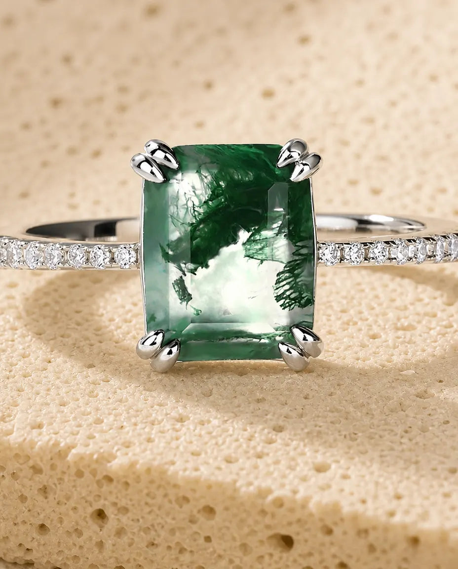 Emerald-cut moss agate pave solitaire ring in sterling silver with double-claw prongs and pave band