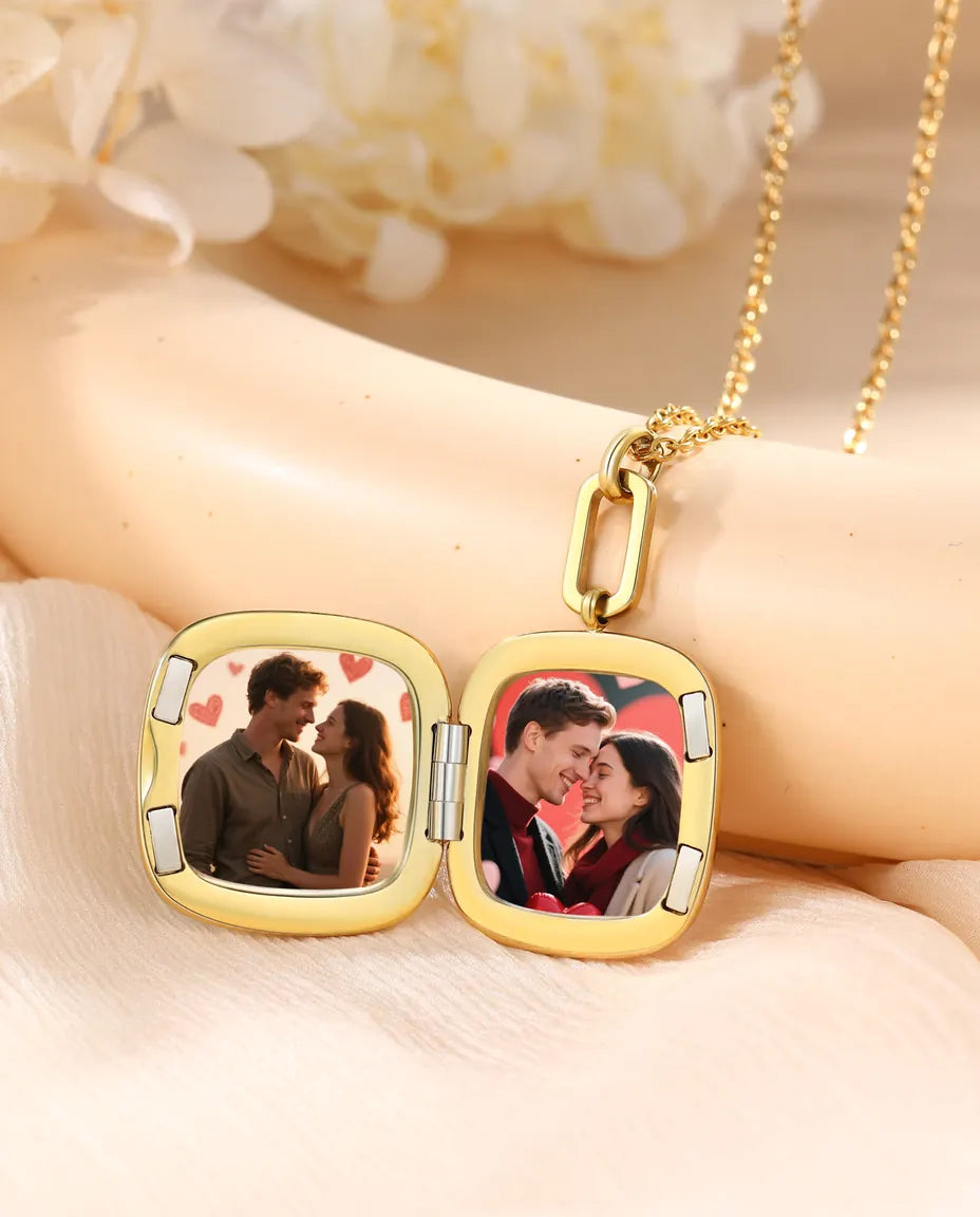 Enamel locket open showing two square photos inside