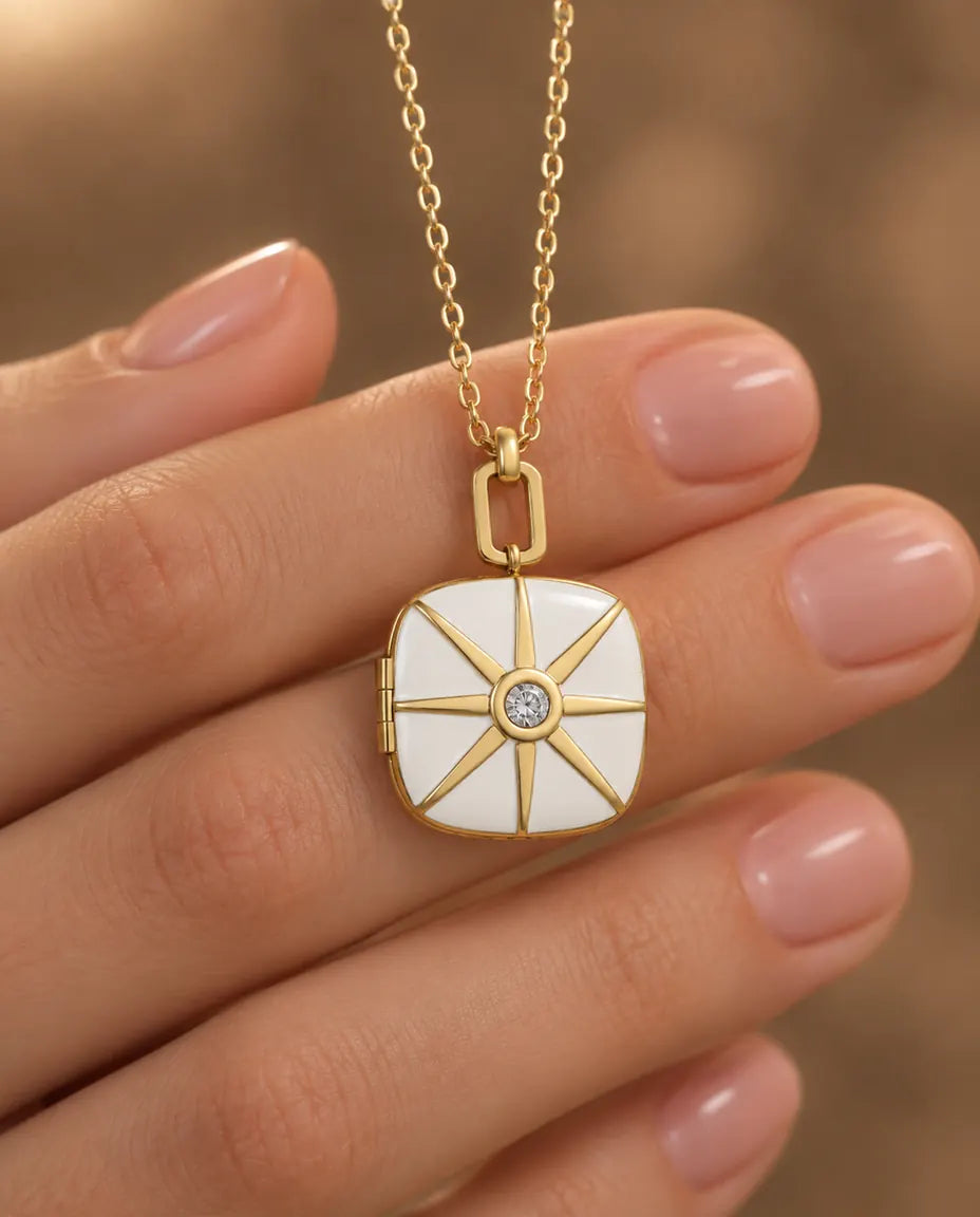 Personalized Enamel Photo Locket Necklace That Holds 2 Pictures held in hand