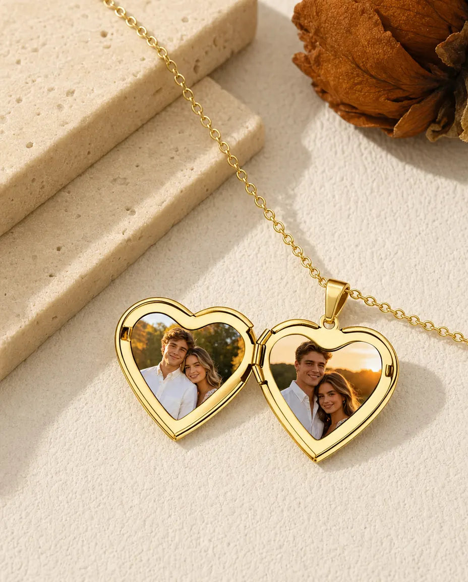 Gold heart locket necklace open holding two custom photos in heart frames