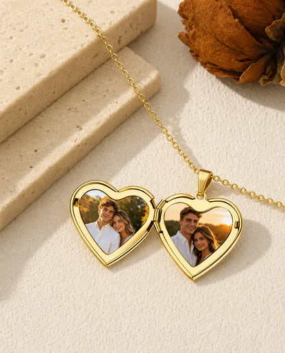 Gold heart locket necklace open holding two custom photos in heart frames