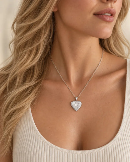 Personalized Floral Heart Locket Necklace That Holds 2 Photos with Custom Back Engraving worn on a model