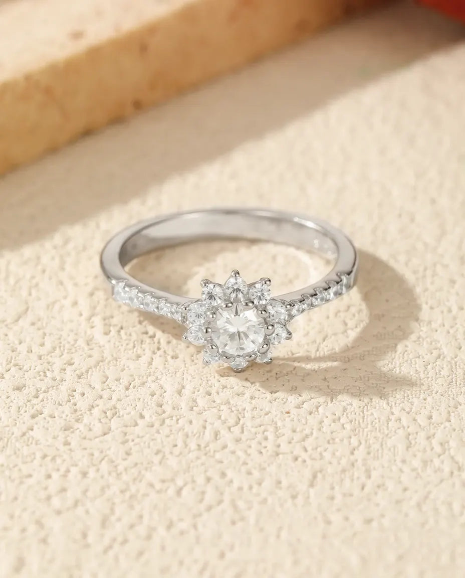 Flower halo moissanite engagement ring in 925 sterling silver with sunburst halo