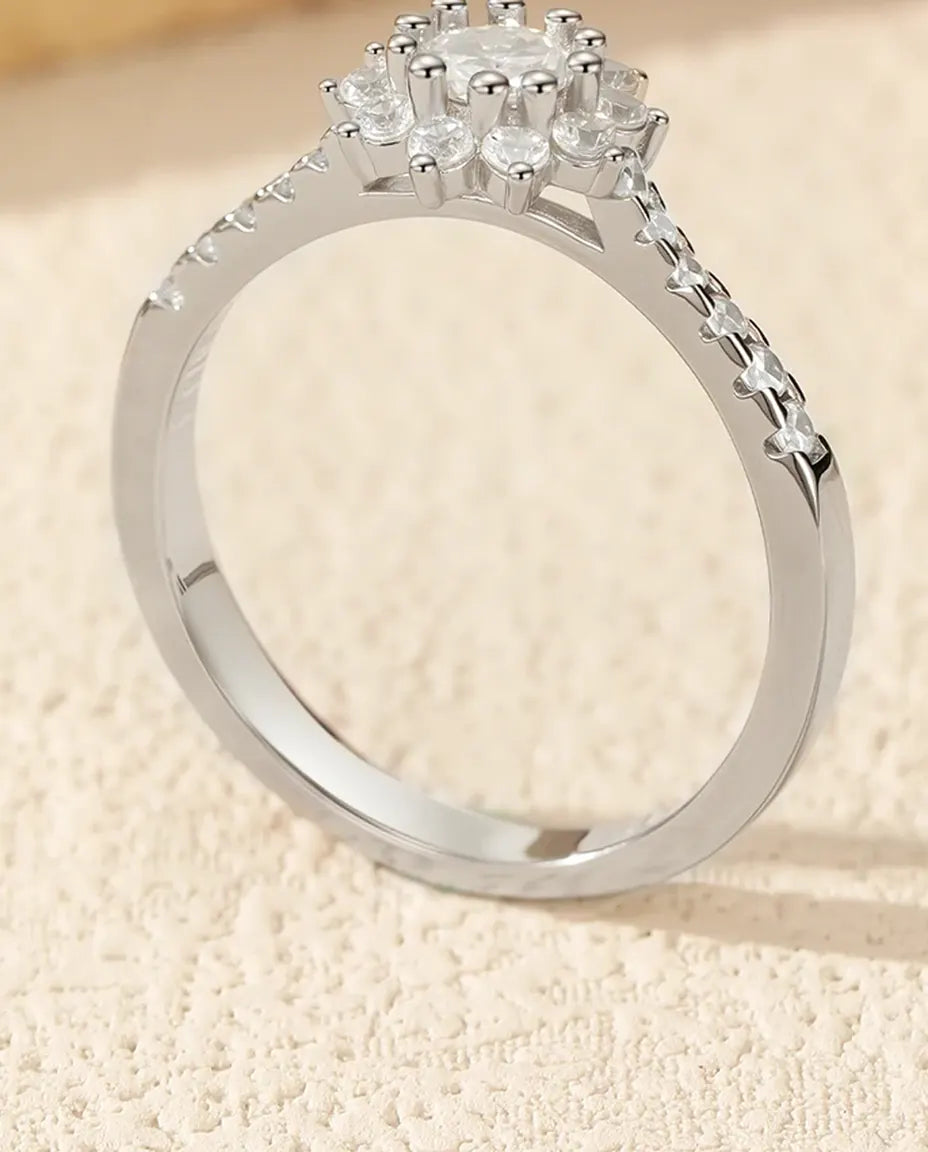 Flower halo moissanite engagement ring in 925 sterling silver with sunburst halo