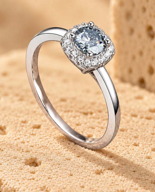 0.5ct Square Halo Moissanite Ring - displayed on a travertine block