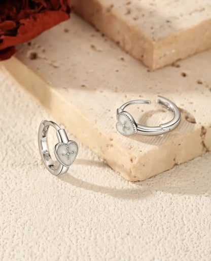 Heart cross huggie earrings in 925 sterling silver