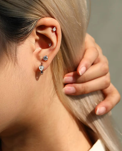 Heart cross huggie earrings in 925 sterling silver