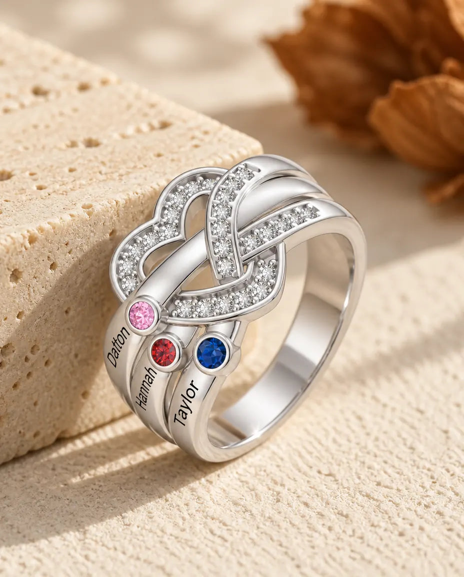 heart knot birthstone ring with 3 engraved names and 3 bezel set birthstones on the left shoulder