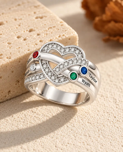 heart knot birthstone ring with 4 engraved names and 4 birthstones, two on each shoulder