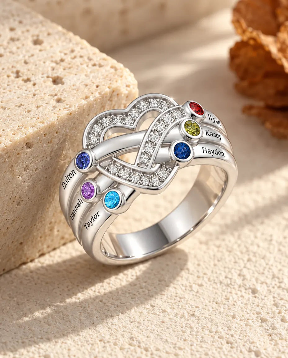 heart knot birthstone ring with 6 engraved names and 6 birthstones, three on each shoulder