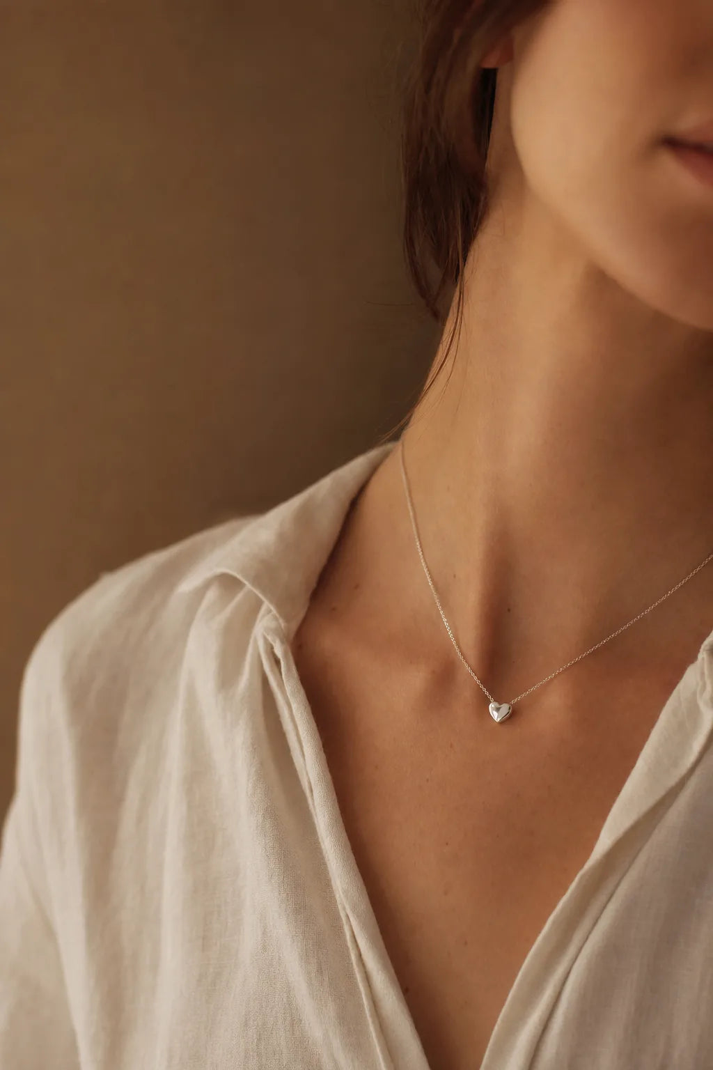 IfShe personalized silver heart pendant necklace worn close to the heart
