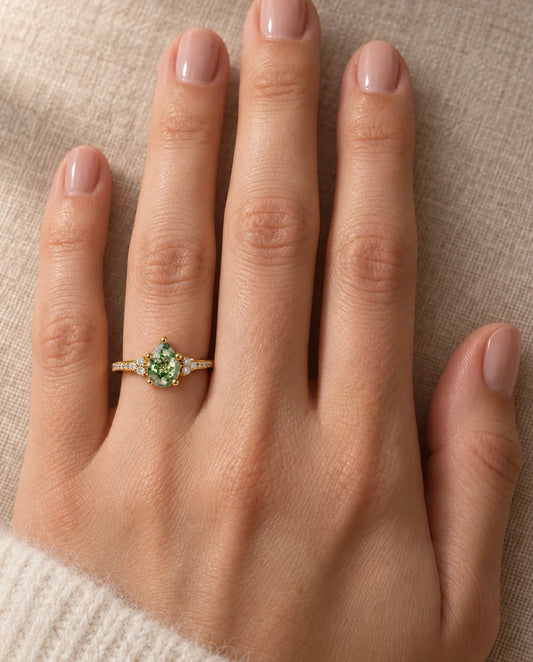 Pear-Shaped Moss Agate Ring in Silver or Gold - worn on the hand