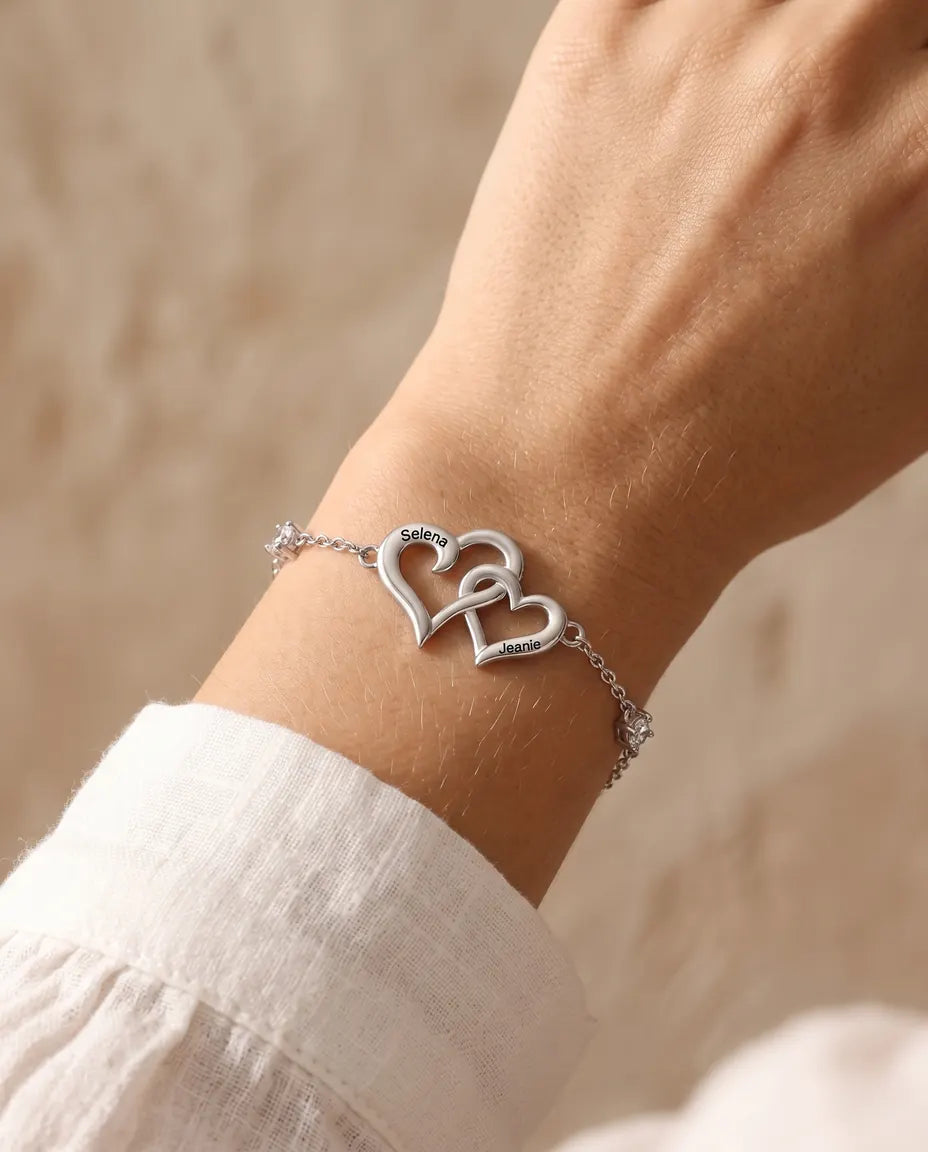 Interlocking hearts birthstone bracelet on a model