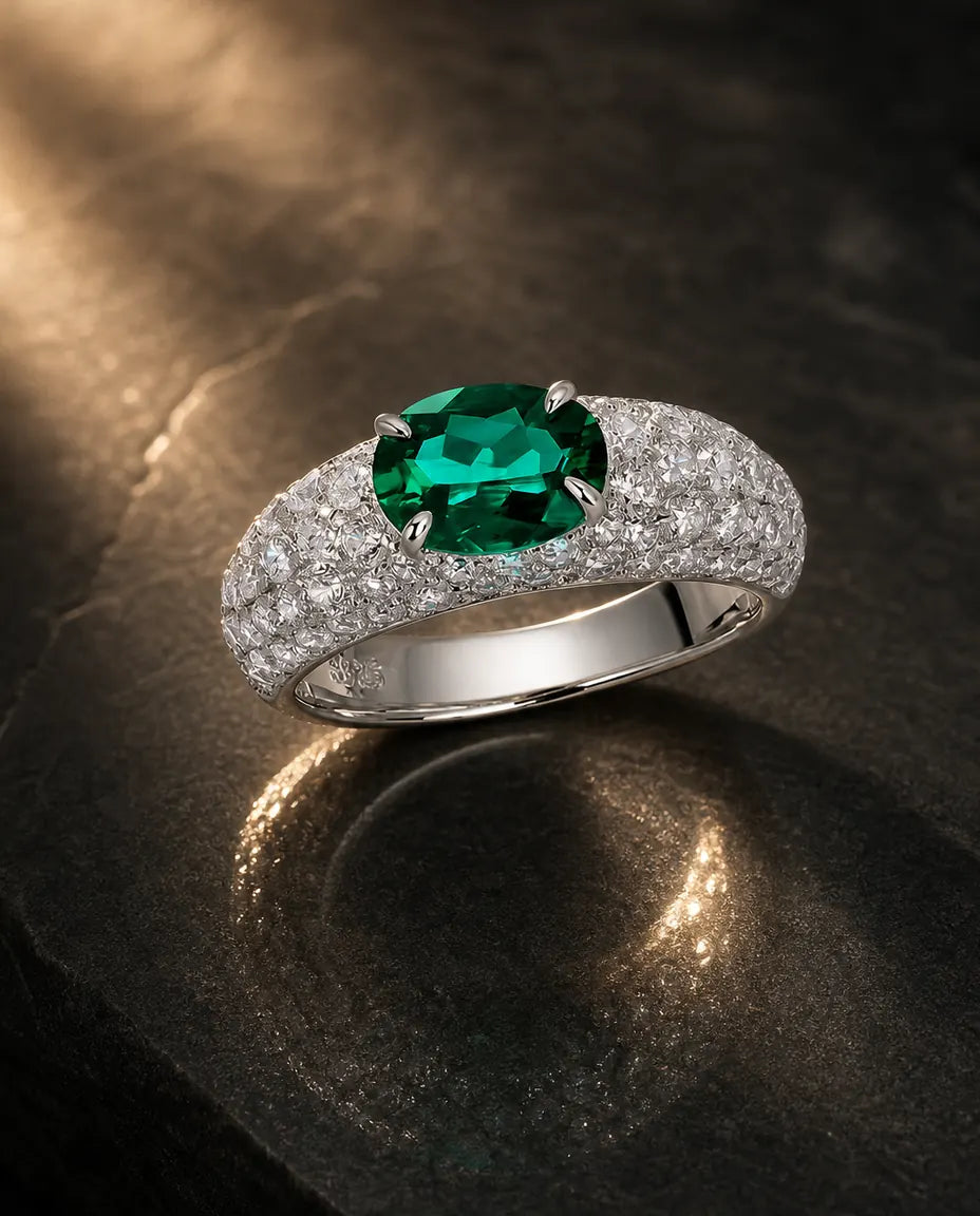 Lab-created emerald oval ring in 925 sterling silver with white pave band