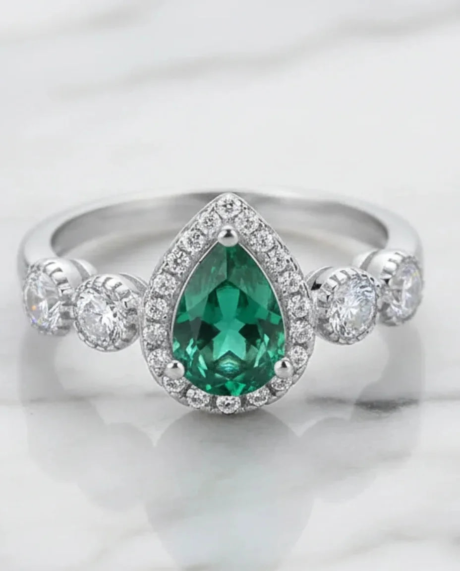 Lab grown pear cut emerald ring in 925 sterling silver