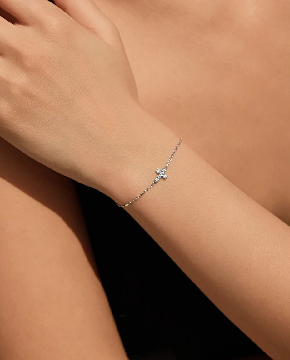 Moissanite cross charm bracelet in 925 sterling silver