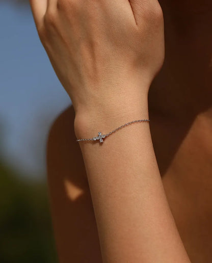 Moissanite cross charm bracelet in 925 sterling silver